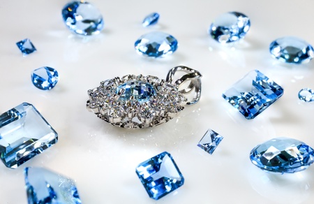 Pendant with diamonds and sapphires scattered aroundの写真素材