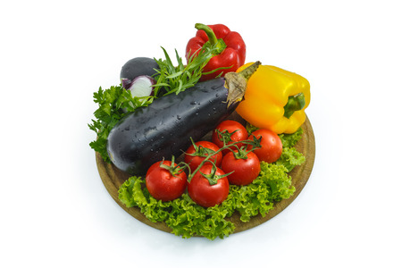 Fresh vegetables on a sheet of white plastic, close-upの写真素材