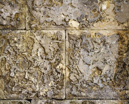 Photo old masonry with abstract patterns, closeupの写真素材