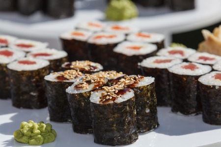 Sushi plate in asian restaurant, close upの写真素材