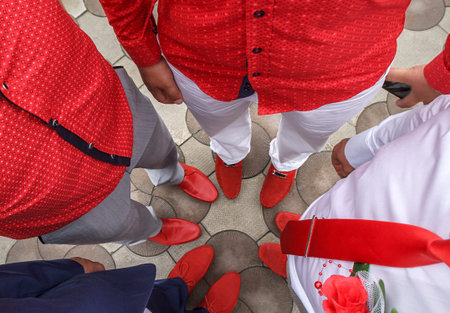 Friends by arrangement, came to the celebration, in red shoesの写真素材