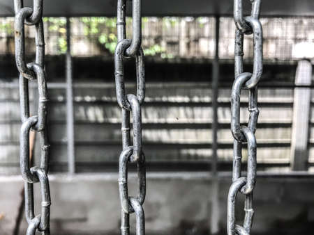 Close up view of 3 rows of chains.の写真素材
