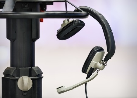 professional headphones in a TV Studio on a tripodの写真素材