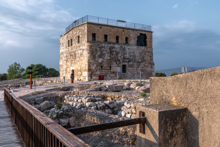 Stone citadel and archaeological ruins at Sepphoris National Park in the Galilee, Israel. Ancient fortification above excavations under a moody sky, cultural heritage travel landmarkの写真素材