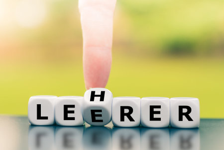 Hand turns a dice and corrects a typo by changing the German word Leerer (empty in English) to...