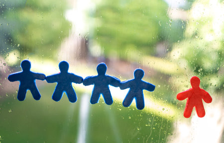 Symbol of discrimination. Blue figures are united wile red figure is isolated.