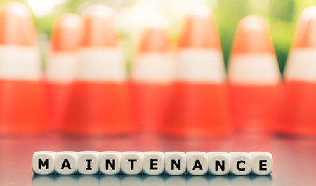 Dice form the word "maintenance".の写真素材