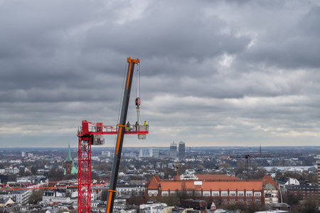 Assembling a construction crane in Hamburg, Germany.の写真素材