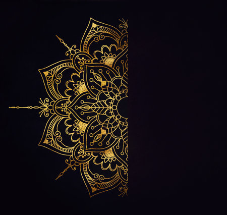 gold pattern ornament on dark backgroundの写真素材