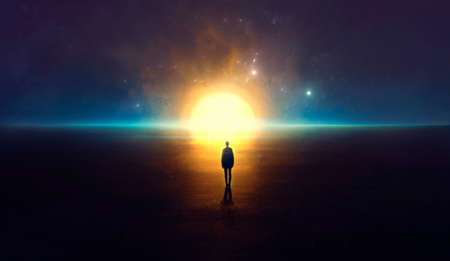 silhouette of a man against the bright sun and starry skyの写真素材