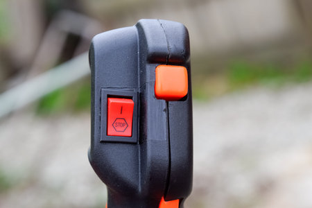 Knob with trimmer controls. Gas trimmer, equipment controls. Trimer gascosis with a leaf for mowing...