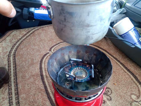 Krasnodar, Russia - June 12, 2019: A mobile gas stove in the truck cab of a trucker.のeditorial素材