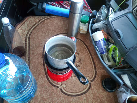 Krasnodar, Russia - June 12, 2019: A mobile gas stove in the truck cab of a trucker.のeditorial素材