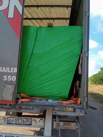 Taman, Russia - June 9, 2019: cargo displacement inside the truck. The gas block moved off the pallet. Damage to the cargo.のeditorial素材