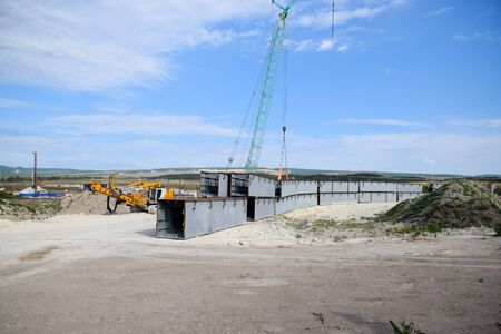 Steel parts of the bridge structure. Construction of a road junction.の写真素材