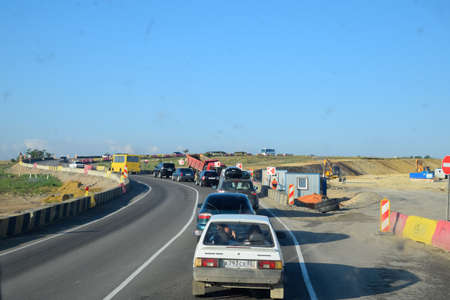 Taman, Russia - June 9, 2019: Traffic jam on the road, a lot of cars on the track.のeditorial素材