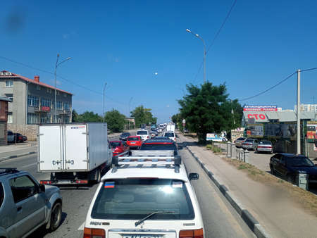 Taman, Russia - June 9, 2019: Traffic jam on the road, a lot of cars on the track.のeditorial素材
