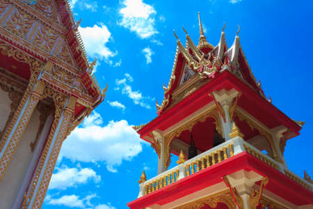 thai Buddhism temple and blue skyの写真素材