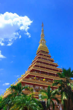thai Buddhism temple and blue skyの写真素材