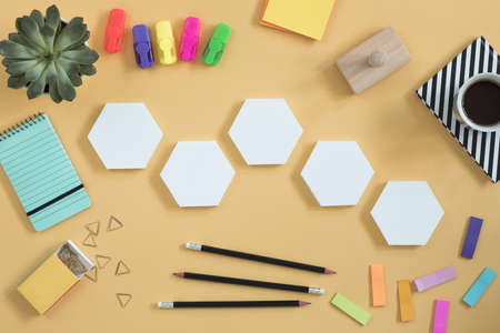 Creative desk with mock up shapes for projects idea. Concept for business, industry, it.の写真素材