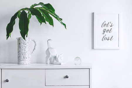 Stylish and modern white interior with mock up frame , cacti and cat figures. White concept of...