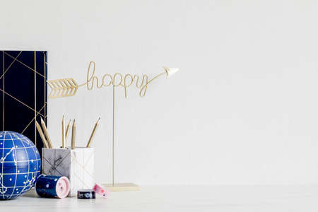 Cosmic and stylish home interior with cool office accessories, tapes, supplies, notes, memo sticks,...