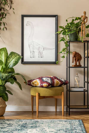 Stylish retro home staging of living room with black mock up poster frame, design furnitures, a lot...