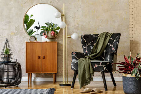 Modern retro composition of living room interior with design armchair, lamp, rattan pouf, plants,...