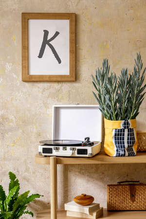 Neutral composition of sitting room interior with brown mock up photo frame, design wooden console,...