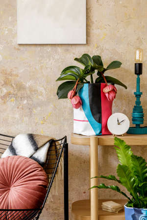 Stylish composition of sitting room interior with mock up photo frame, wooden console, design...