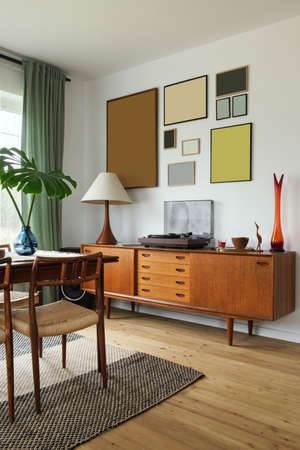 Modern scandinavian home interior of living room with design retro furniture, tropical palm, gallery...