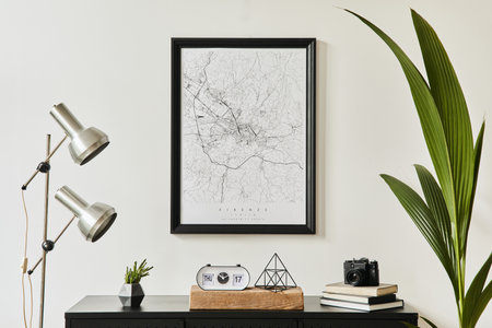 Stylish composition of living room interior with design black commode, a lot of plants, mock up poster map, decoration, silver lamp and elegant personal accessories. template. Modern home decor.の写真素材