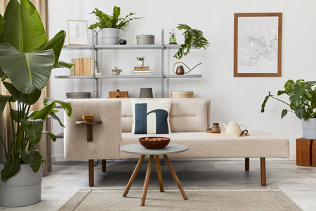 Cozy interior with stylish sofa, design coffee table, bookcase, plants, carpet, decoration, mock up...