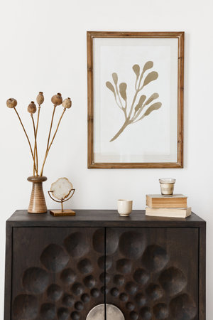 Interior design of ethnic style living room with mock up poster frame, modern commode, round mirror,...