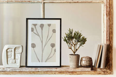 Unique living room in modern style interior with design decoration, mock up poster frames on the old window, book and elegant pesronal accessories in home decor. Template.の写真素材