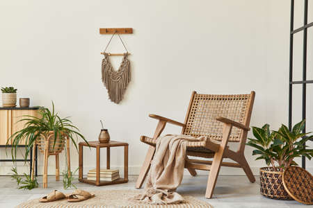 Modern composition of living room interior with design armchair, loft wall, stool, decoration,...