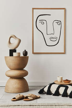 Stylish interior of living room at cozy home with mock up poster frame, wooden stool, decoration, pillow, slippers and elegant personal accessories in modern home decor. Template.の写真素材