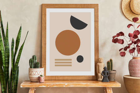 Creative composition of stylish living room interior with mock up poster frame, wooden bench, cacti and personal accessories. Plant love and nature concept. Template.の写真素材