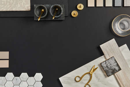 Flat lay composition of creative black architect moodboard with samples of building, textile and natural materials and personal accessories. Top view, black backgroung, template.の写真素材