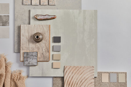 Flat lay of creative architect moodboard composition with samples of building, textile and natural...