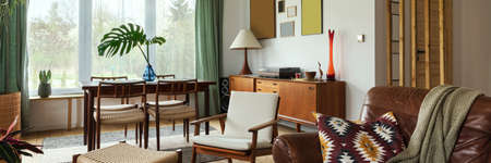 Modern scandinavian home interior of living room with design retro furniture, tropical palm, gallery...