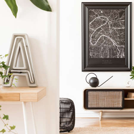Creative composition of cozy and stylish living room interior design with mock up poster frame,...
