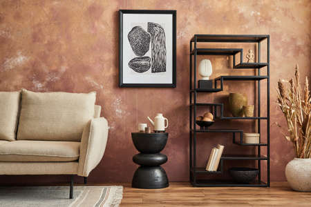 Stylish composition of modern living room interior. Mock up poster frame, black metal shelf, sofa...