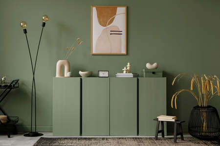 Modern living room interior composition with mockup poster frame, sage green wooden commode and...