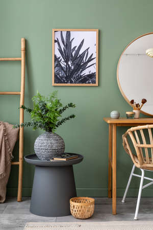 Elegant details of modern interior design with wooden sideboard, bed, mirror, painting and stylish...