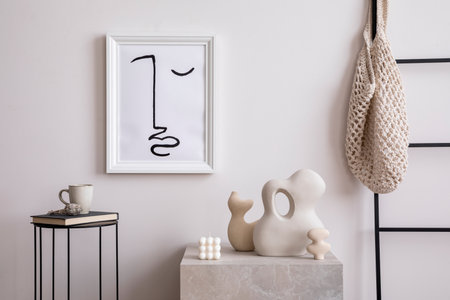 Aesthetic interior of living room with mock up poster frame, white wall, coffee table, vase with dried flowers and elegant personal accessories. Stylish home decor. template.の写真素材