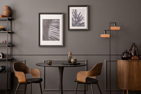 Elegant composition of living room interior with mock up posters frames, round table, lamp, wooden...