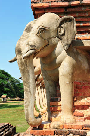 Elephant statue around pagodaの写真素材