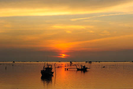 Fisherman boat during sunset, Bangsai, Chonburi, Thailandの写真素材