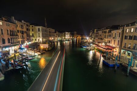 View of Venice canal from Rialto bridge at night, Venice, Italyのeditorial素材